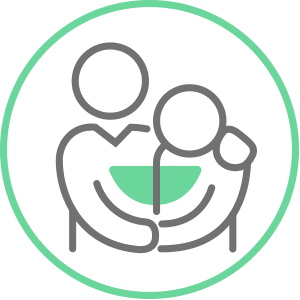 An illustrated circle graphic of two people icons hugging in comfort. 