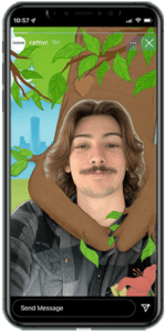 A smart phone screen featuring a smiling young white man using an Instagram filter. It shows an illustrated tree graphic hugging the figure.
