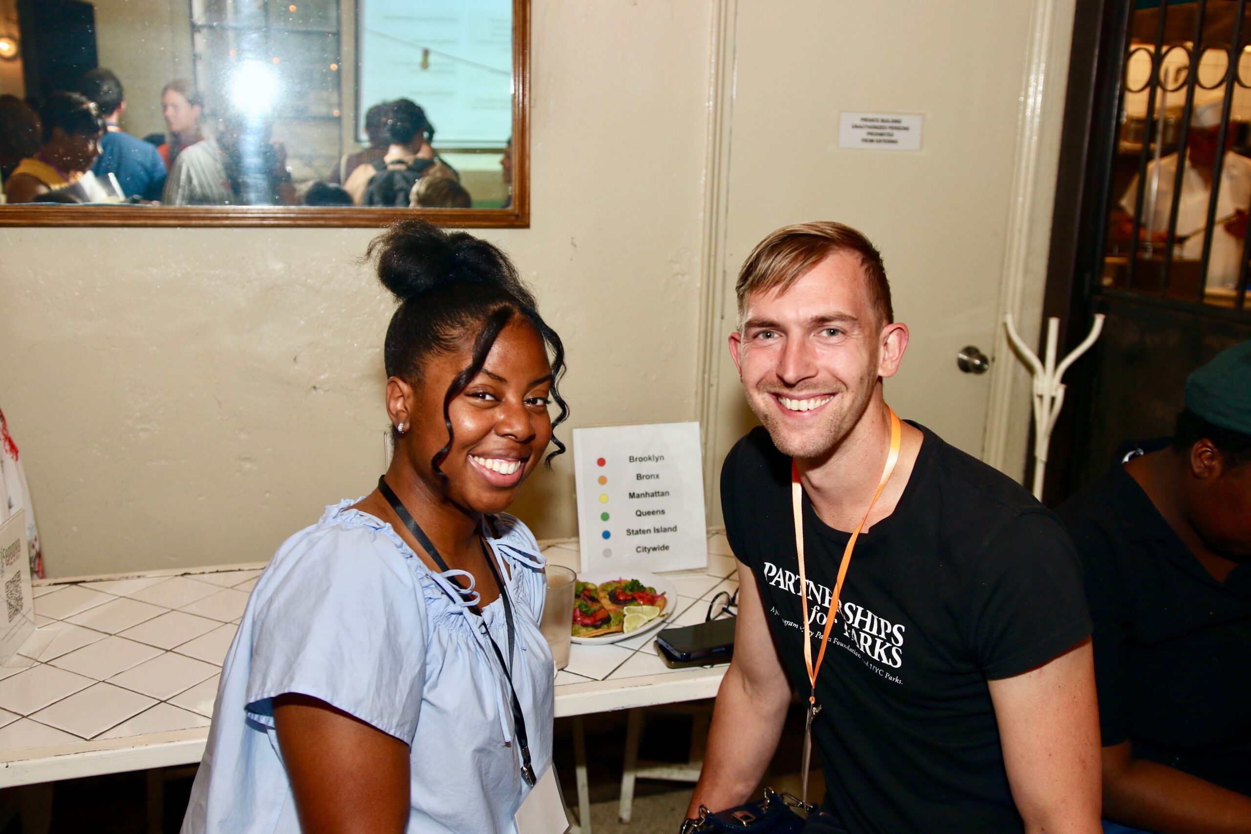 a man and woman smiling at camera