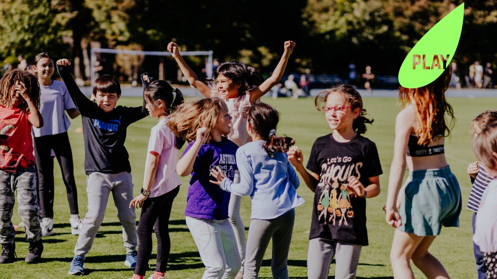 Children playing on a soccer field